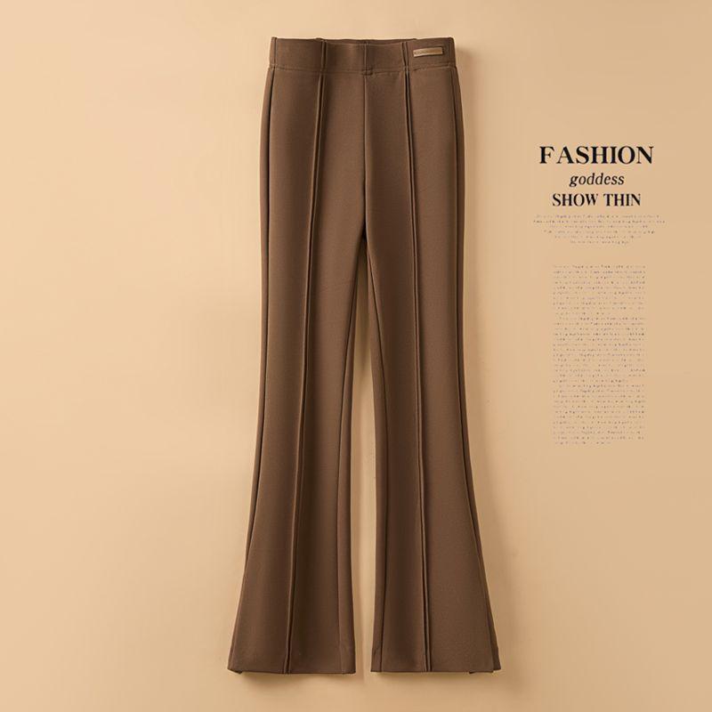 Женские узкие расклешенные брюки с высокой талией: Осень/Зима 2025. Подковообразный фасон с разрезами.