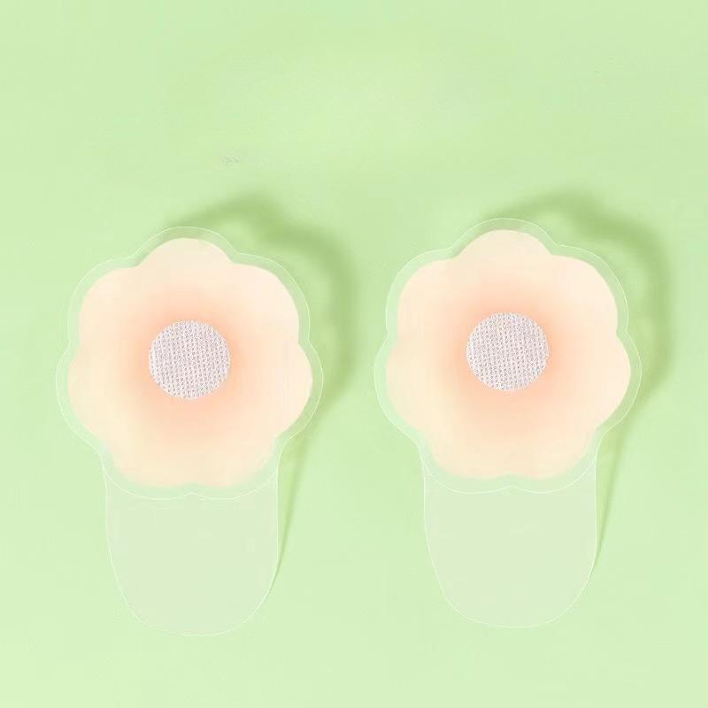 Многоразовые силиконовые накладки на соски с невидимой подтягивающей конструкцией, доступны в круглой и цветочной формах.