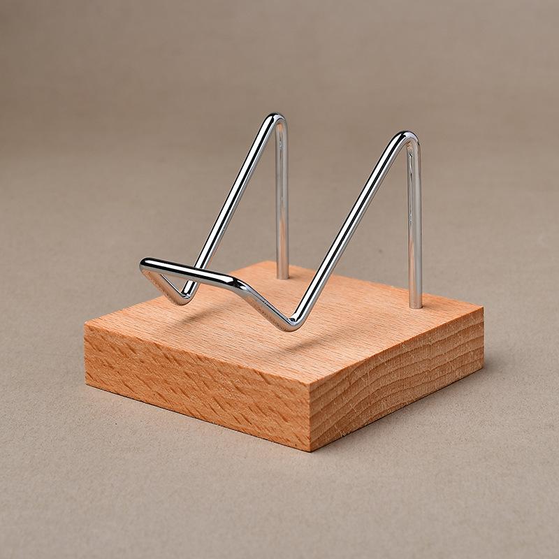 "Heart-Shaped Crystal Mineral Specimen On Iron Stand with Wooden Jewelry Display"