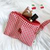 Red cherry canvas makeup bag, portable and easy to carry. Red plaid, large capacity cosmetic lipstick storage bag.