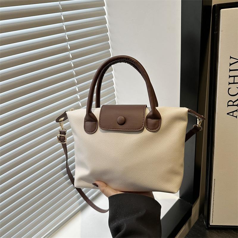 Сумка-пельмень женская 2025 весенний взрыв высококачественная наплечная сумка модная вставка контрастного цвета сумка-мессенджер высококлассная женская сумка