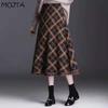 Женская осенне-зимняя вязаная юбка средней длины с кисточками и высокой талией, клетчатая юбка