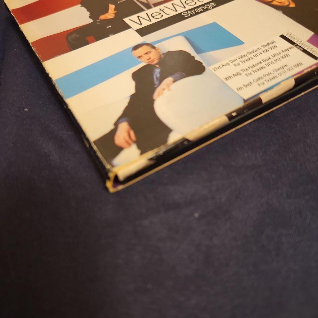 [USED] WET WET WET Strange