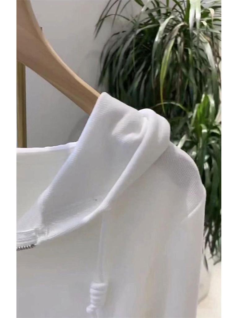 Женская однотонная толстовка с капюшоном нестандартного кроя из коллекции осени 2023 года — модный топ с длинными рукавами.