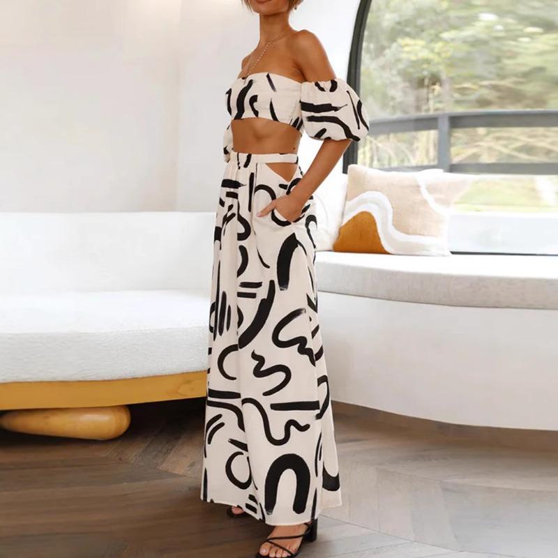 Женский летний костюм с пышными рукавами и длинной юбкой