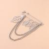 Temperament light luxury hollow leaf brooch, retro trend metal chain pin accessories