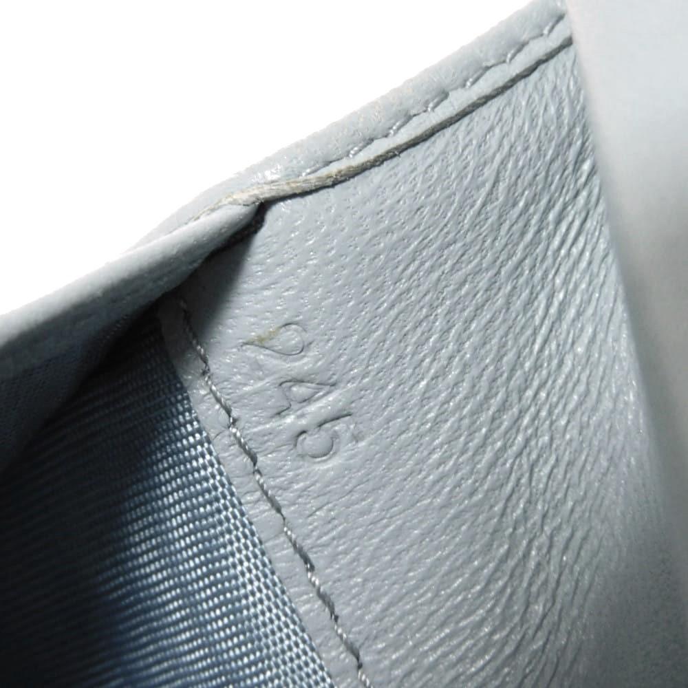 Б/у Компактный кошелек на молнии с узором Matelasse (5ML002 N88 F0012 7941) с RFID и кожей ягненка. Металлический логотип. Женский Cielo из Японии