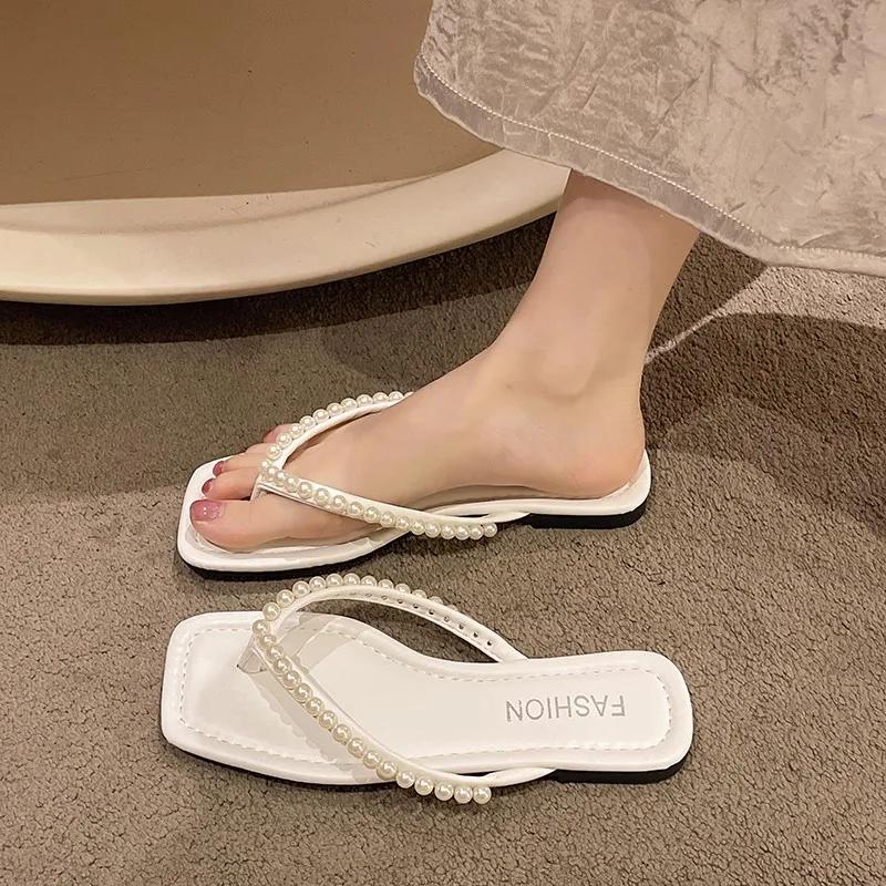 Мода 2024 Новая мода Горячая распродажа Женские шлепанцы Сланцы Носок-петля Носить Отделка бисером Однотонный Удобный Универсальный Повседневный Zapatos