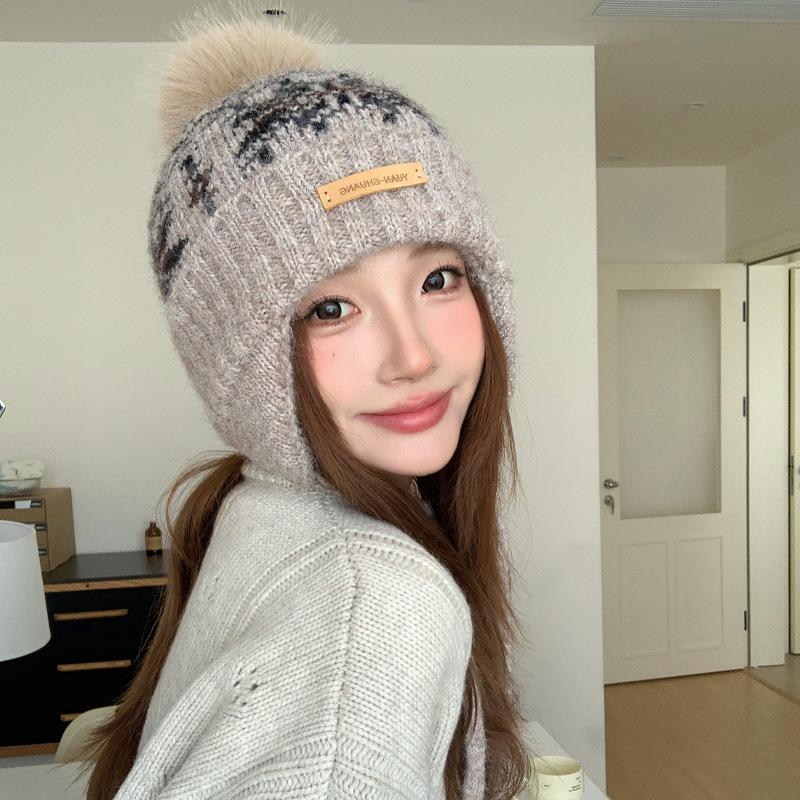 Winter hat women's snowflake jacquard warm knitted hat windproof and cold protection ear protection headgear versatile casual wool hat