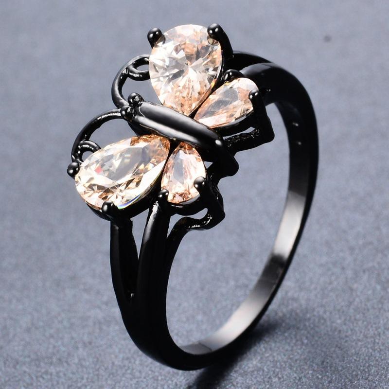 eBay black gold blue zircon butterfly ring, small animals