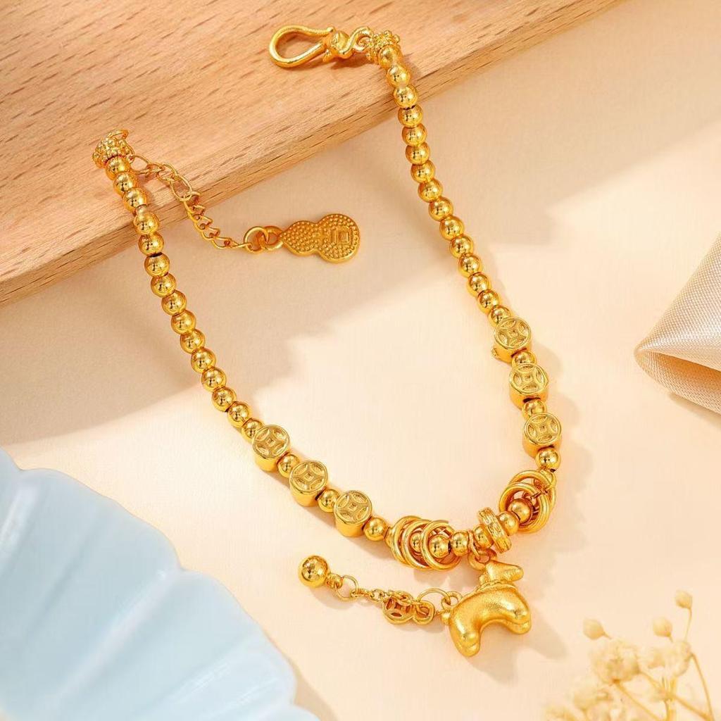 Женский браслет-спираль из монет и бусин с золотым покрытием - Нишевая роскошная бижутерия