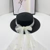 Summer elegant bow straw hat women's fashion flat top straw top hat streamer big eaves beach hat sun hat