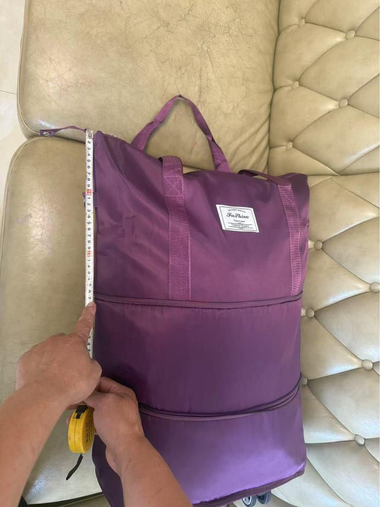 Дорожная сумка на колесах со складной ручкой