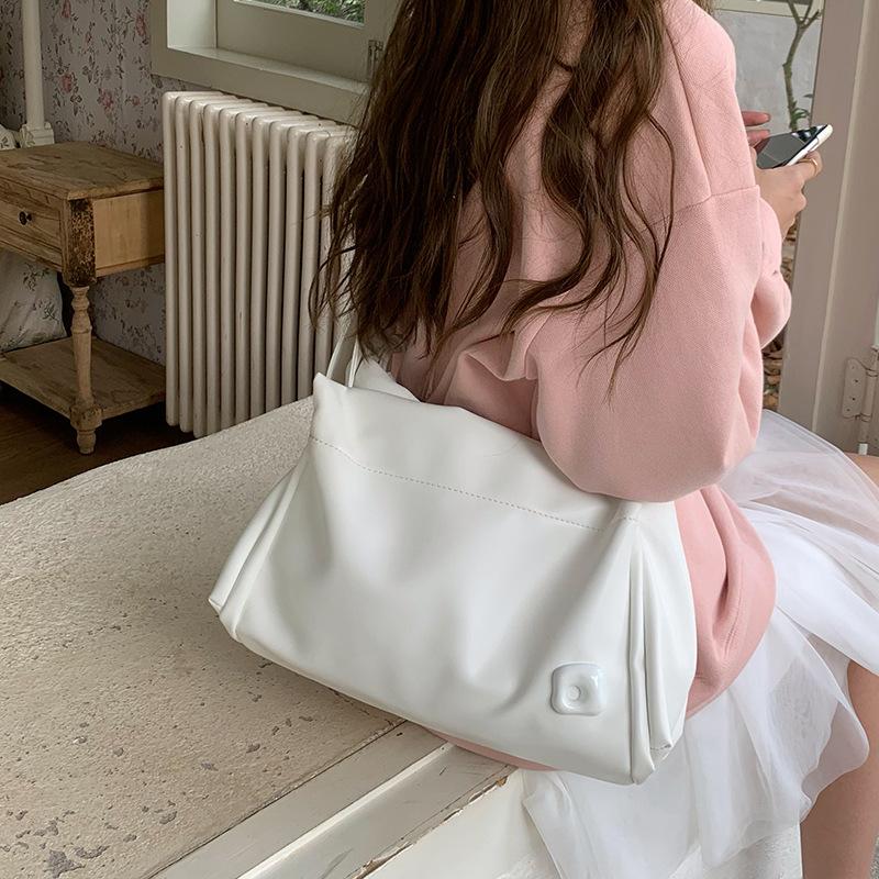 Вместительная розовая студенческая сумка для повседневной носки, сумка-игрушка для поездок на работу, новая текстурированная сумка через плечо для женщин