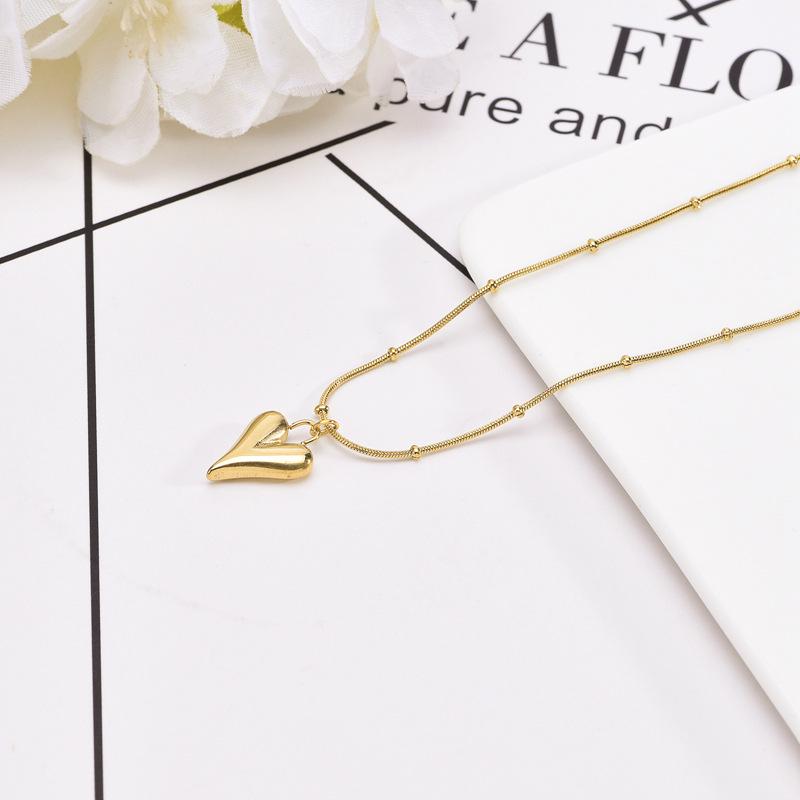 Ожерелье-сердце из титановой стали с 18-каратным золотым покрытием - Шикарная нишевая ключичная цепочка