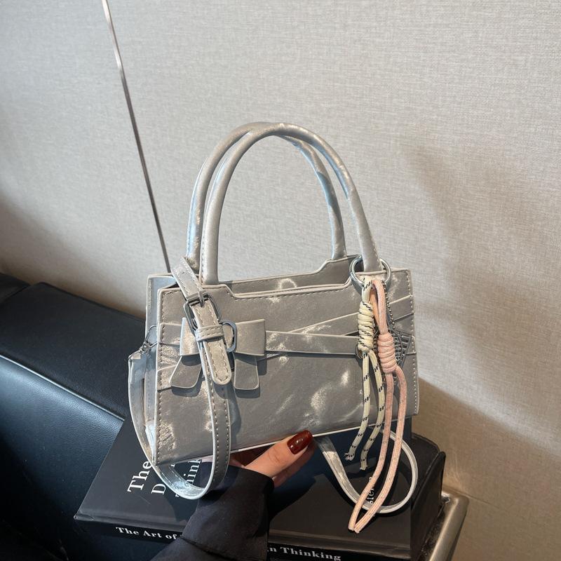 Премиальная сумка в иностранном стиле женская 2025 новая простая нишевая дизайнерская сумка через плечо, сумка-мессенджер, модная портативная сумка-тоут