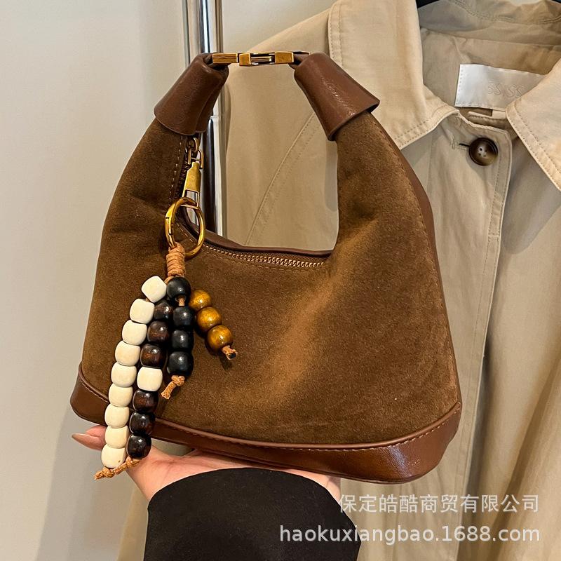 Сумка премиум-класса нишевая женская осень-зима 2025 новая матовая ретро сумка-мессенджер повседневная взрывная портативная сумка-пельмень