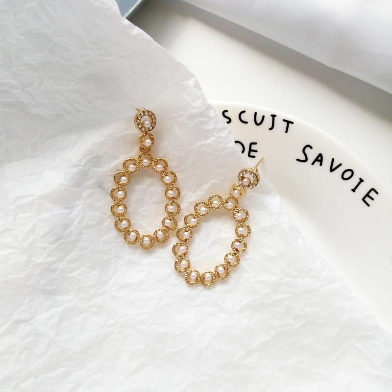 Korean S925 Sterling Silver Pearl Stud Earrings - Trendy and Elegant Design