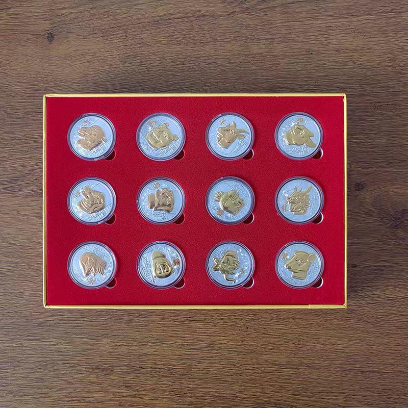 Двухцветные памятные монеты и медали с головами животных китайского зодиака - коллекционное издание.