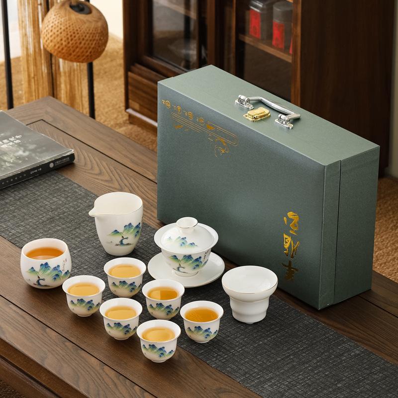 Suet jade porcelain Kung Fu tea tea set, household full set of ceramic tea cup cover bowl Dehua white porcelain tea maker