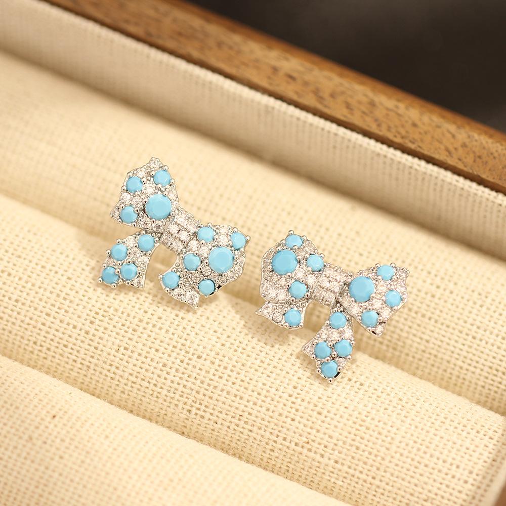 Shining diamond zircon bow stud earrings women's light luxury fashion personality niche design sense high-end sense earrings flash