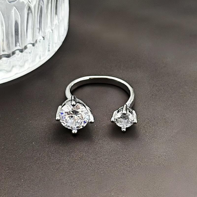 Звездный свет на кончике пальца~ Взрывное кольцо с цирконом с двойной головкой Женское нишевое дизайнерское кольцо для суставов Легкая роскошь Продвинутое чувство Кольцо для ношения в несколько рядов