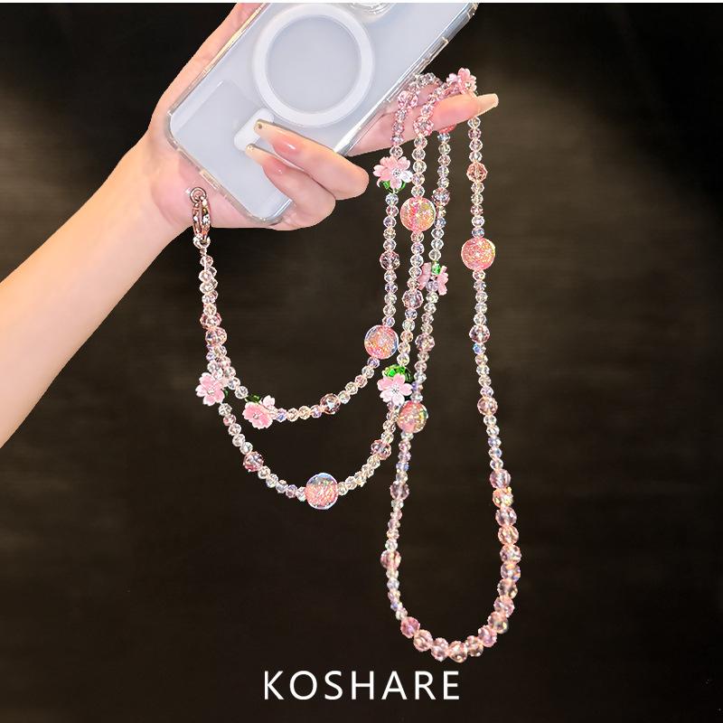 Peach blossom flash messenger mobile phone chain light luxury high-end crystal hanging chain fashionable anti-drop hand carry pendant female beads