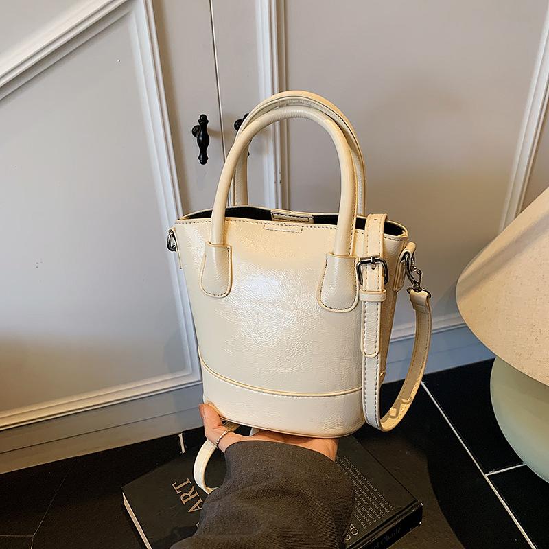 Нишевые дизайнерские сумки женские 2025 новые летние универсальные сумки-мессенджеры для мамы и ребенка популярны в этом году, сумки-ведра