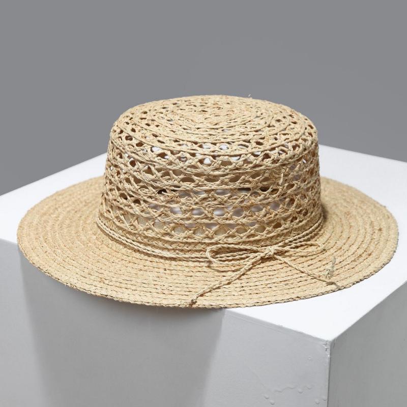 Hollow bow flat top French raffia straw hat women's summer new top hat French seaside sand shows small face