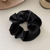 Satin-Feel Scrunchie: Versatile Luxury Hair Tie for Women, Elevates Style & Compliments Skin Tone.