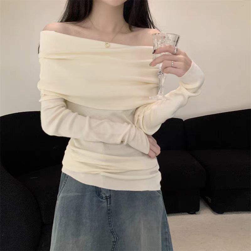 Женский вязаный свитер с открытыми плечами на начало осени 2024 года: Универсальный модный топ на одно плечо