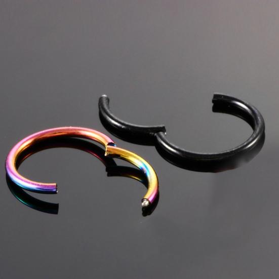 Пирсинг в виде кольца на нос