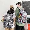 Школьная сумка новая корейская версия модный граффити газета рюкзак ins пара большая вместимость нейлоновый рюкзак
