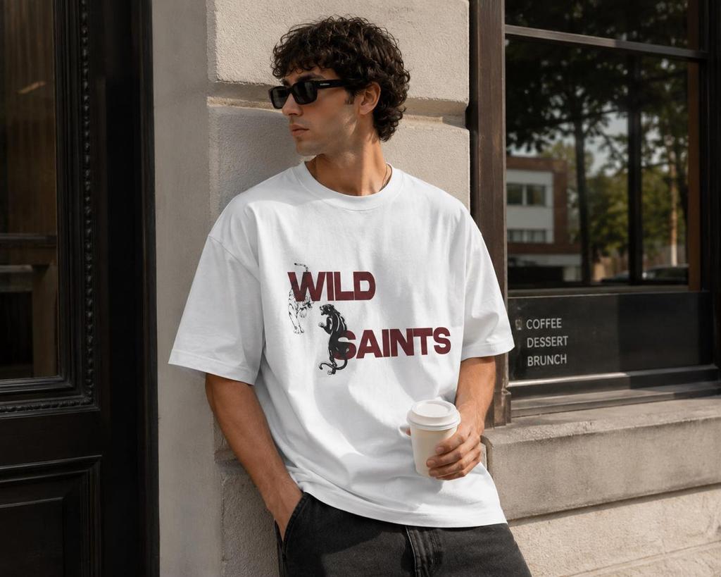 Wild Saints T-Shirt | Grunge Streetwear Tee | Gothic Urban Graphic Shirt | Minimal Alternative Fashion Tee | Edgy Typography Streetwear