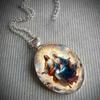 A Pendant Necklace Featuring Jesus, The Virgin Mary, And Christian Faith Themes, With A Time Gem Glass Pendant.