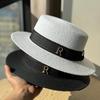 Retro Hepburn-style straw hat for women, suitable for summer outings and vacations at the seaside, beach sun protection hat, vintage flat-brimmed