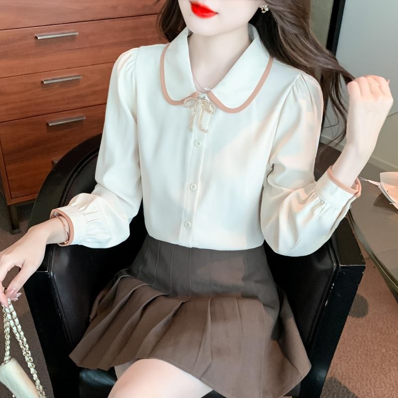 Рубашка с длинными рукавами и воротником-стойкой для женской осенней коллекции с нишевым дизайном и уникальной женской рубашкой