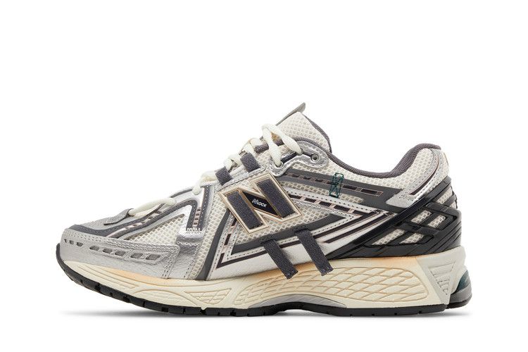 Унисекс кроссовки New Balance 1906A Tech Explosion Серебристый металлик/Castlerock/Золотой металлик