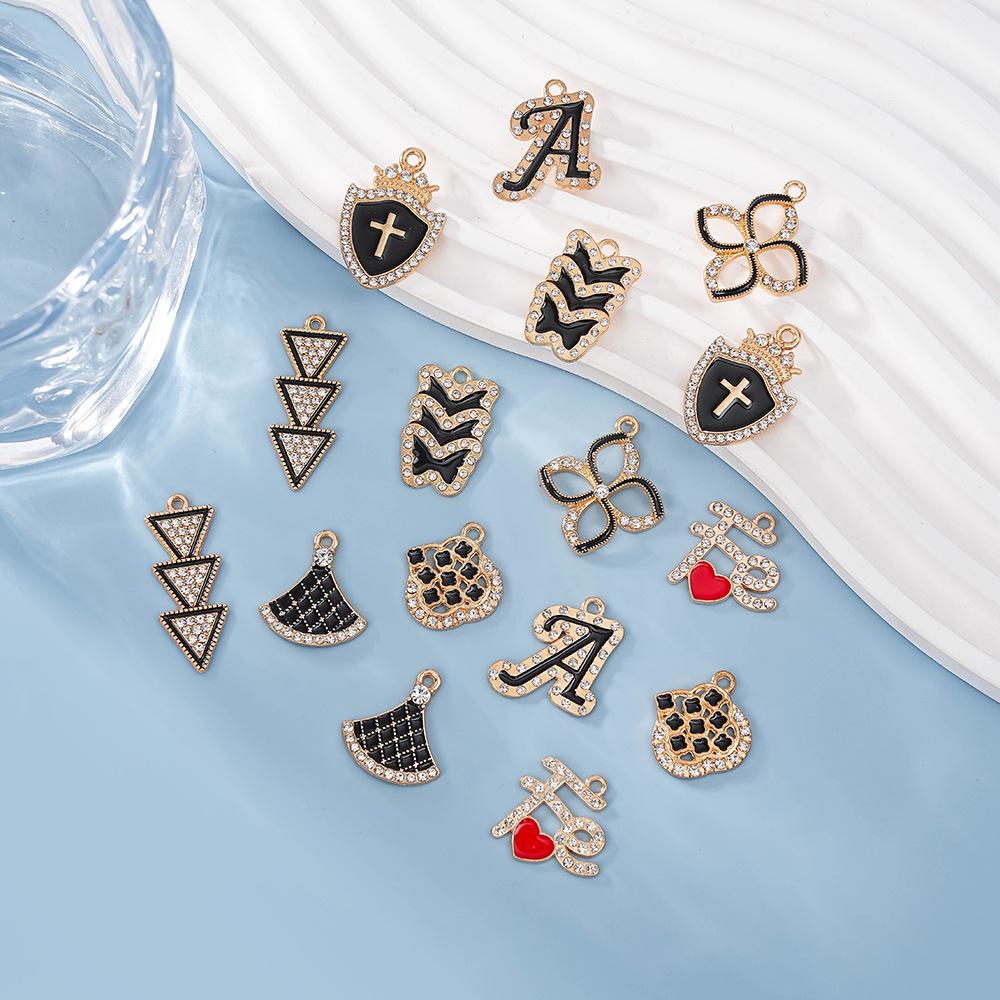 Стильное ожерелье и серьги из сплава циркония своими руками с черным масляным дизайном в виде капли