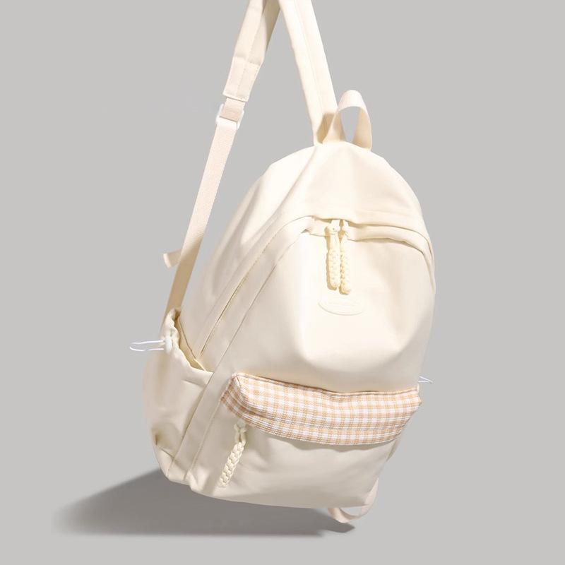 Однотонный высококачественный рюкзак женский 2025 летний новый большая вместимость корейский универсальный школьная сумка для ученика средней школы