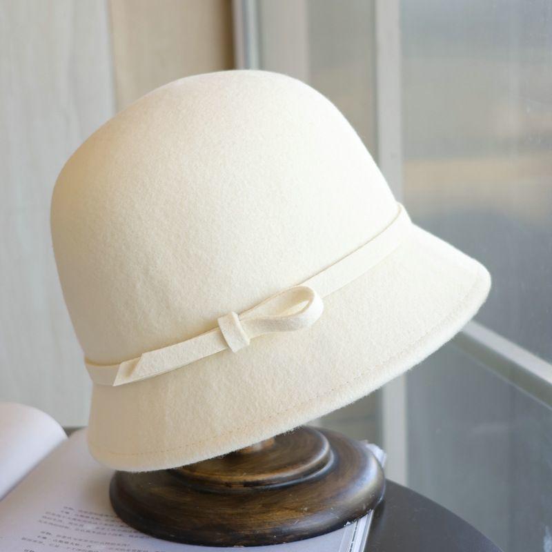 Mu Ling, the Republic of China daughter bow white woolen top hat Hepburn French elegant autumn and winter fisherman basin hat woman