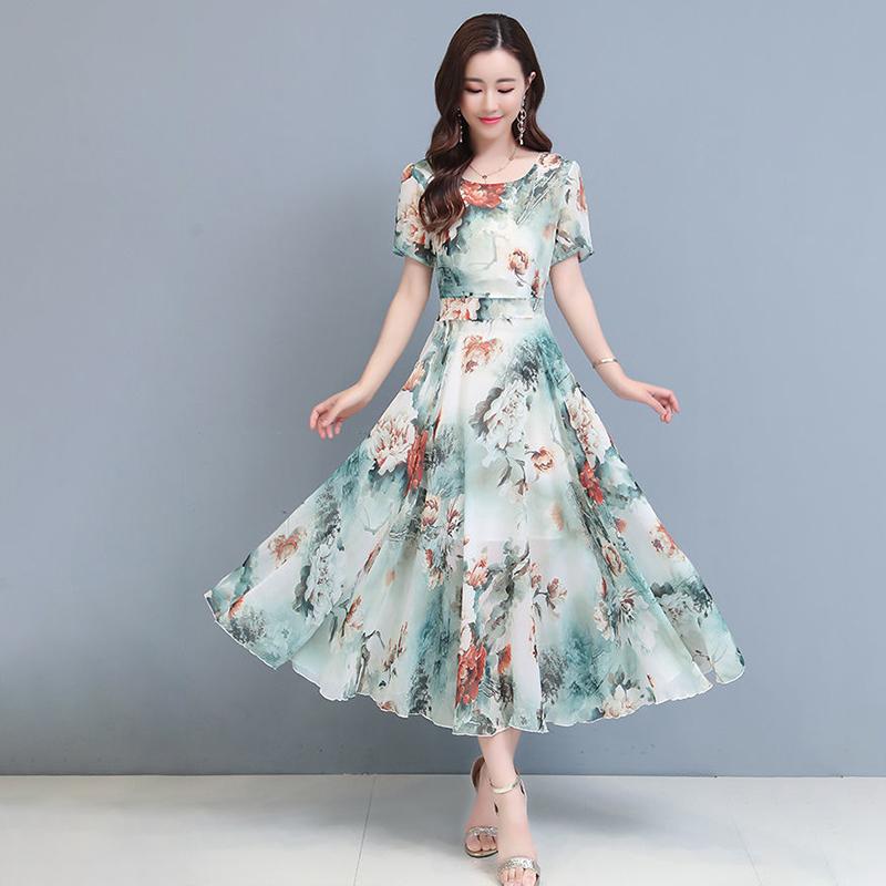 New Elegant Floral Fashion Dress Women's Summer Fashion Cover Belly Slim Long Flowing Dress Beach Skirt.