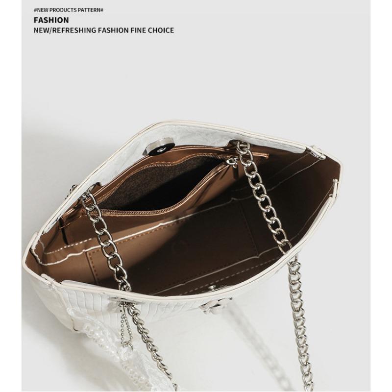 Осенняя женская сумка-тоут с вертикальным кружевным бантом и подвеской. Дизайн женской сумки.