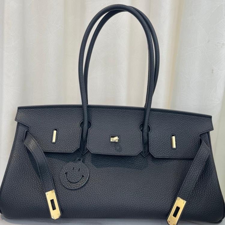 Cross-border trend bag short version oversized portable shoulder bag TOGO first layer cowhide large capacity giant pack