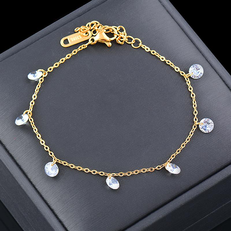 Браслет из титана и титановой стали с кристаллами цвета капли воды