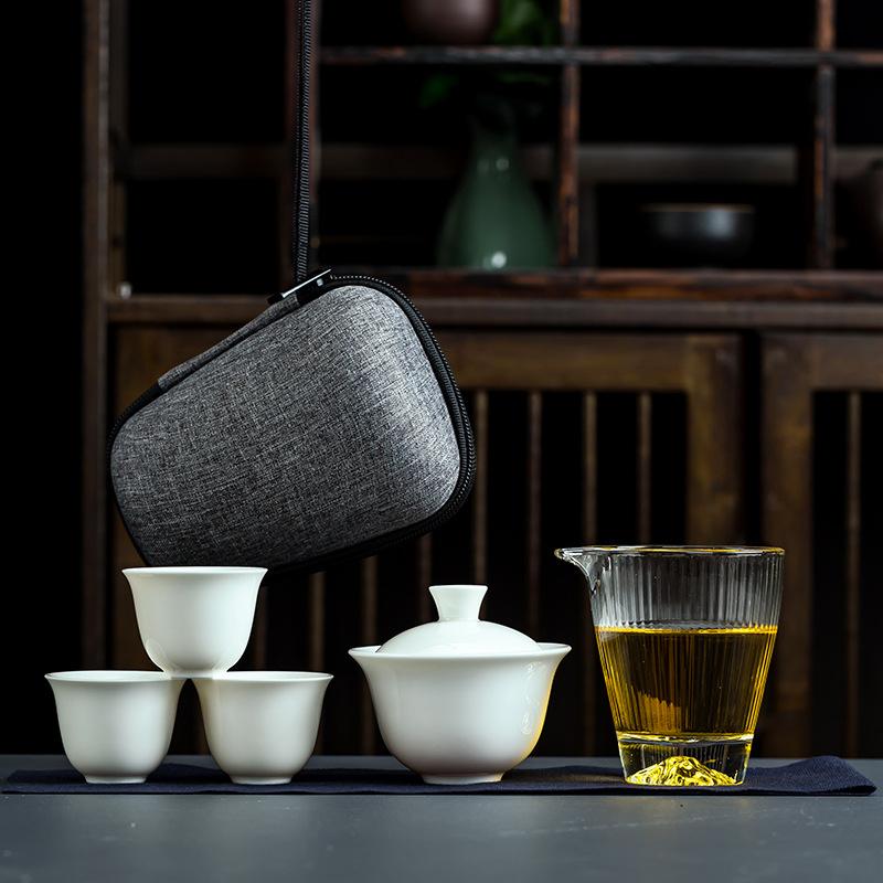 Dehua white porcelain travel kung fu tea set portable bag one bowl three cups glass express cup gifts can be done