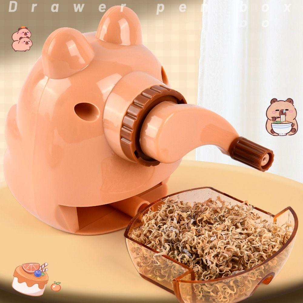 Инструмент для заточки карандашей капибара. Карандаш автоматически входит в механический инструмент с ручным управлением для студентов.