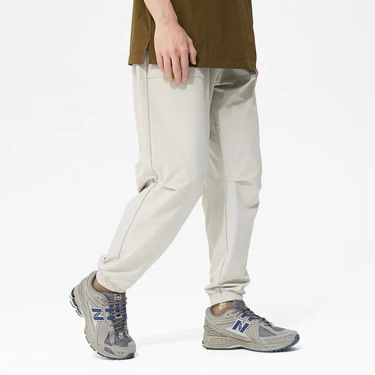 New Balance Knitted Sweatpants Men's Gray Moderate Cuffed Pants (Unisex) Knitted Sweatpants AMP31317 SEN