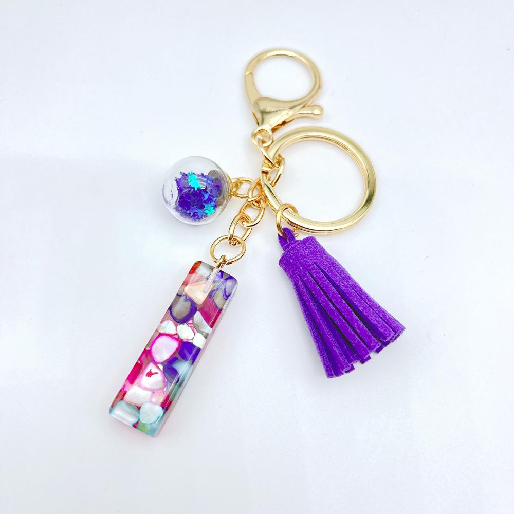 Европейский и американский хит продаж брелок с английскими инициалами и фиолетовой кисточкой