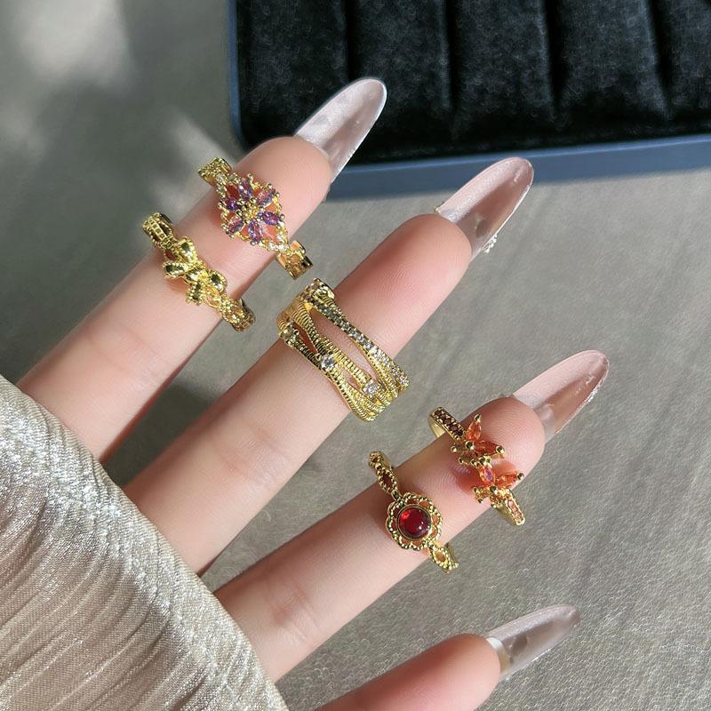 Retro court style stacked wearing light luxury bow open ring female red luan golden qi flower temperament niche index finger ring
